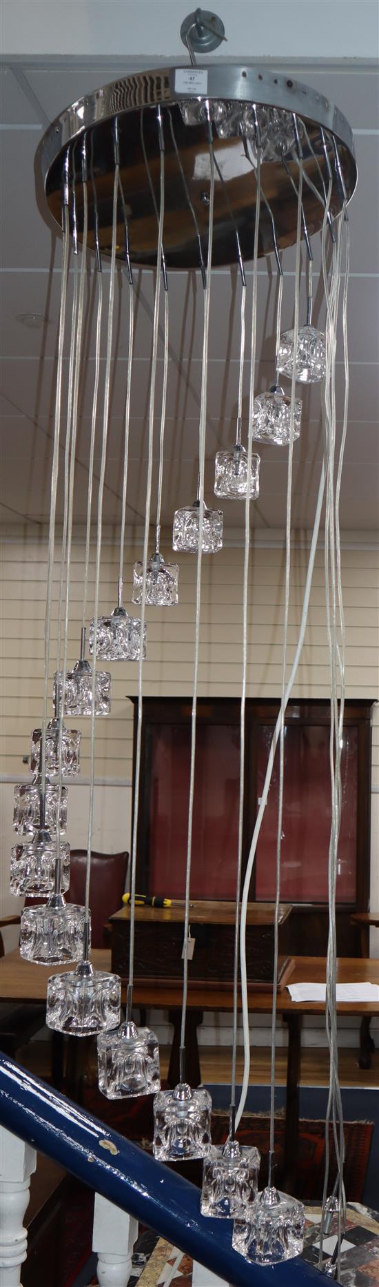 A contemporary ice cube spiral cluster glass and chrome pendant ceiling light